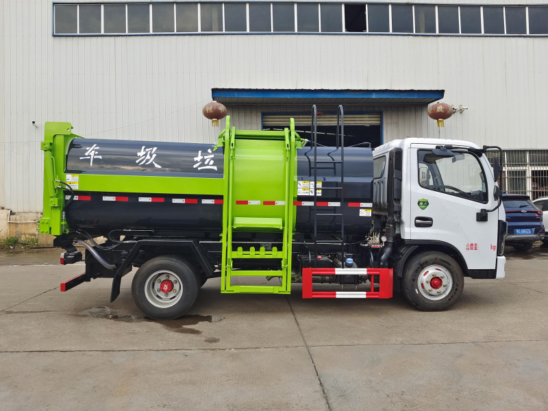東風多利卡D6 黃牌7.5方自裝卸式垃圾車
